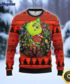 NFL Cleveland Browns Ugly Sweater Grinch Hug Ugly Christmas Sweater For Fans